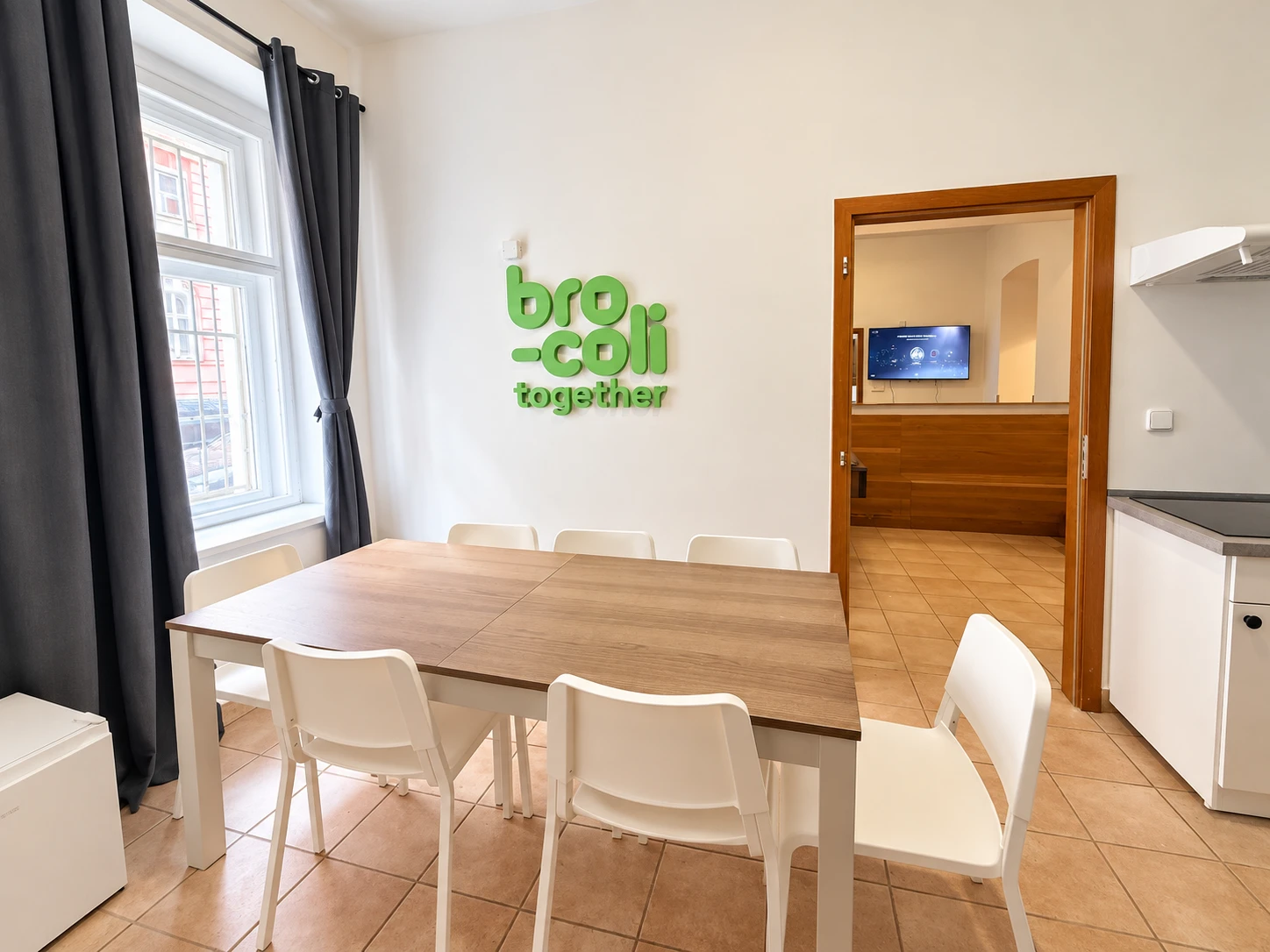 Community lounge with TV at Bro-coli Žižkov