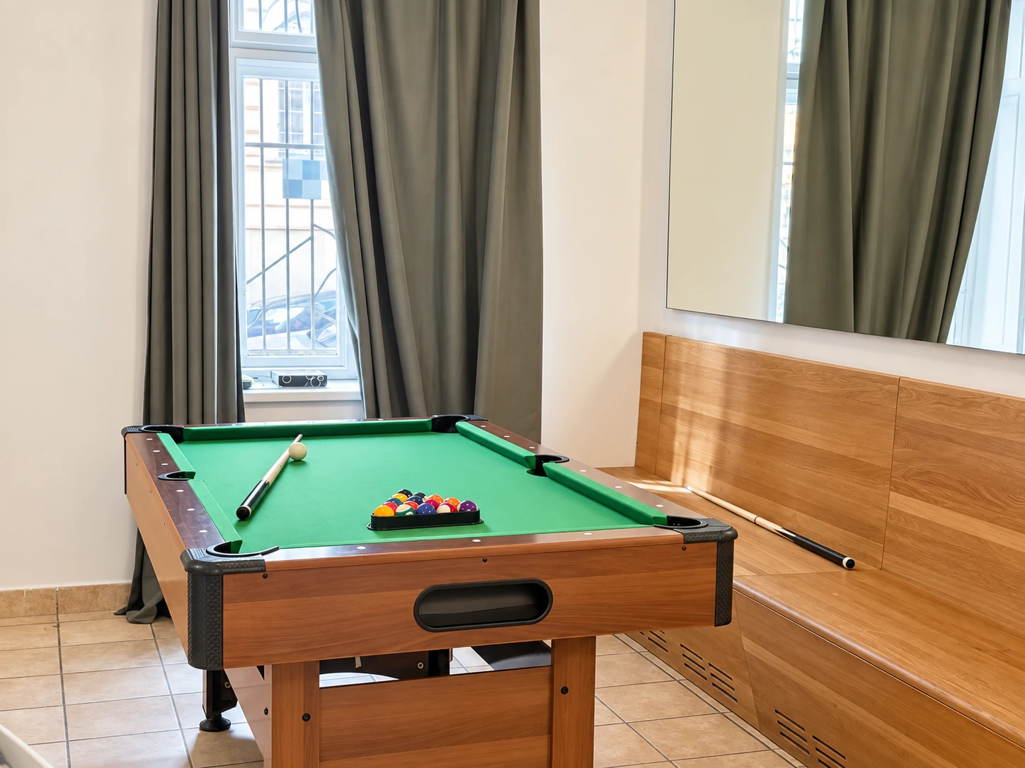 Pool table in the community room at Bro-coli Žižkov